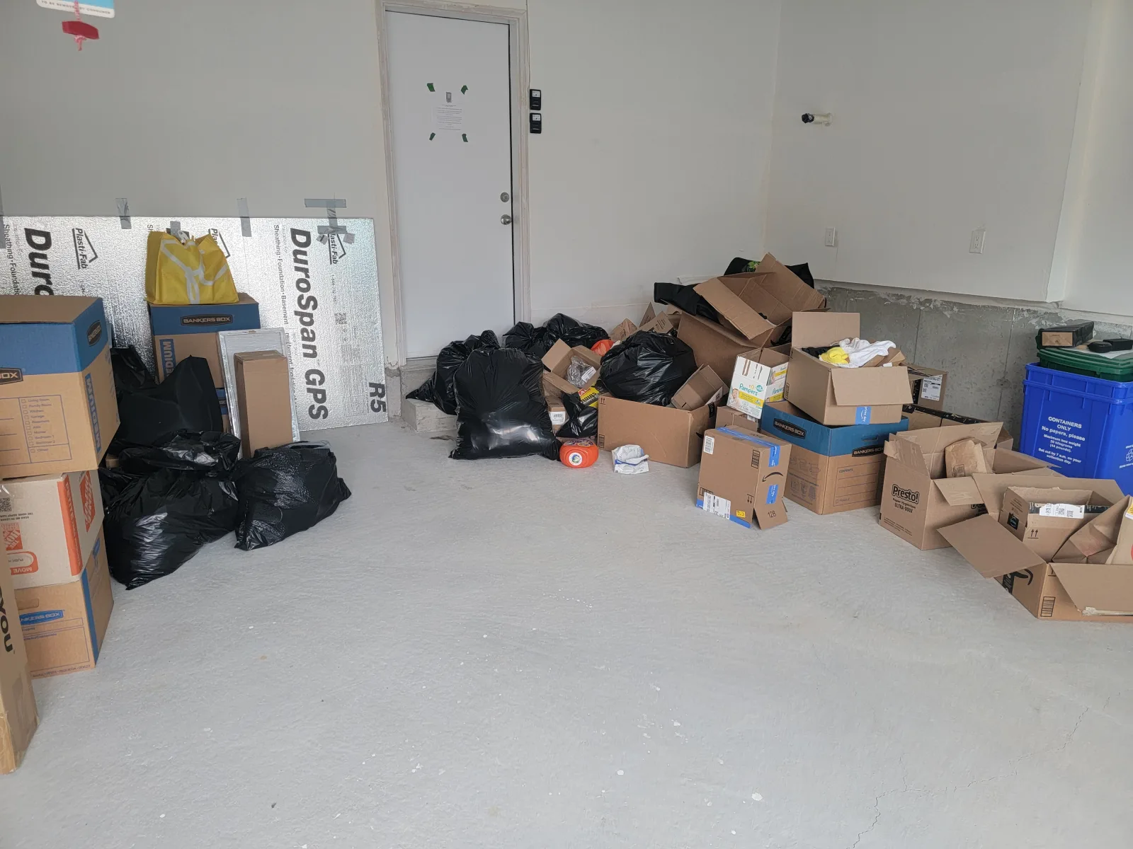 Before — Garage Cardboard & Bagged Waste Removal in Oshawa in Oshawa